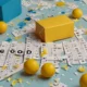 “Create a bright, engaging visual layout focused on the theme ‘Be of Good Cheer’ derived from an NYT Mini Crossword clue. Center the design around a crossword-style grid highlighting the word ‘EXULT’ in bold colors (yellow/blue) popping out from the grid. Surround it with festive, joyful graphic elements—celebratory confetti, tiny jumping figures, or sparkle accents. Use clean, modern typography for title text ‘BE OF GOOD CHEER’ above the grid. Style: infographic-meets-illustration, with high readability—great for both photorealistic rendering (Leonardo AI’s Photorealistic/DreamShaper) and crisp vector illustration (Freepik AI). Emphasize a cheerful color palette: pastel yellow, light blue, and white.”